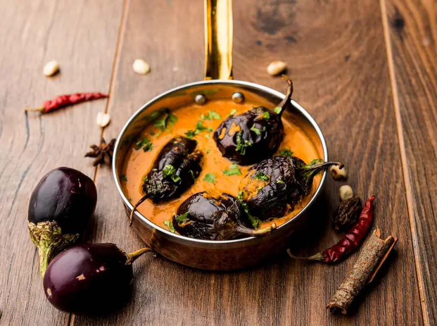 Ready to eat eggplant curry (baingan masala) Indian brinjal curry in rich spiced gravy served in a bowl