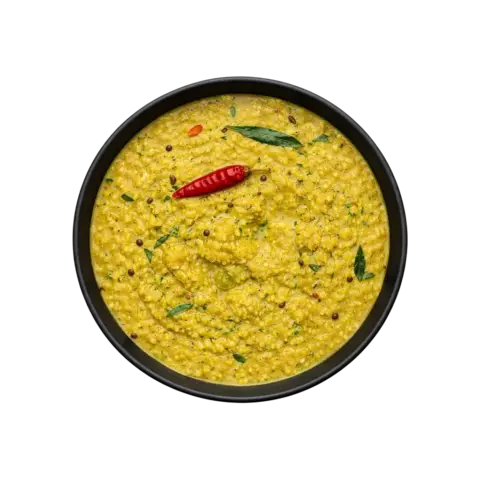 South Indian Chow Chow Kootu ready to eat chayote lentil curry in black bowl