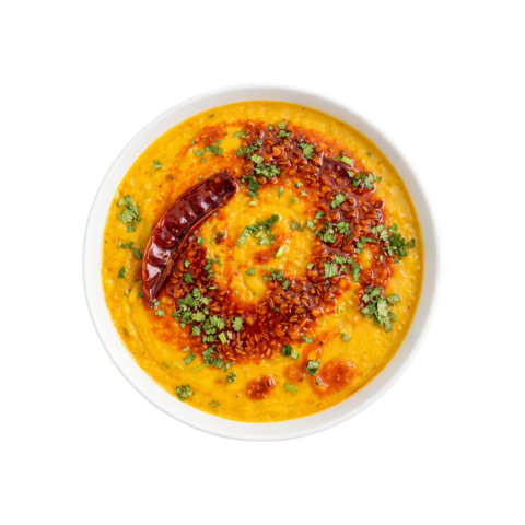 North Indian Dal Tadka ready to eat lentil curry in white bowl