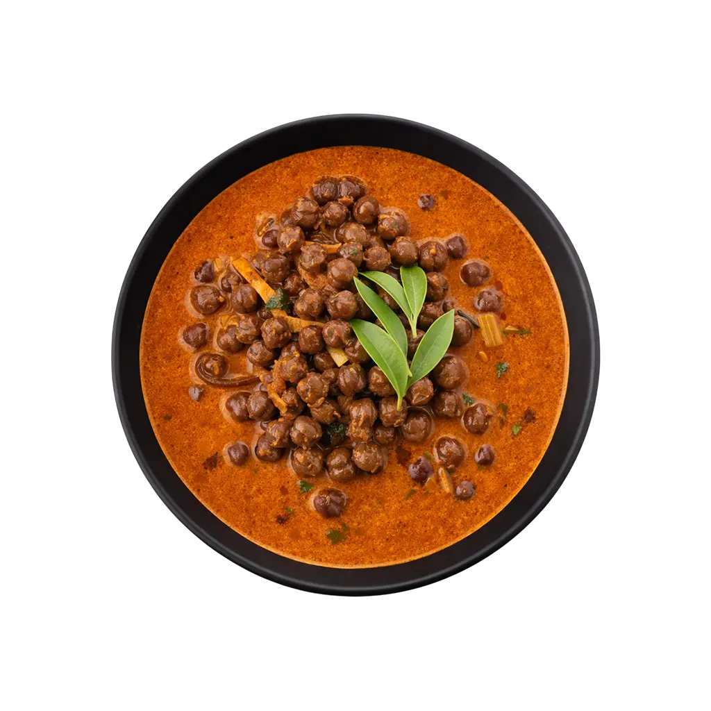 Kerala Kadala Curry ready to eat black chickpea curry in black bowl