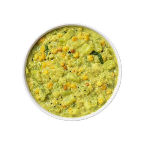 South Indian Pudalangai Kootu ready to eat snake gourd lentil curry in white bowl