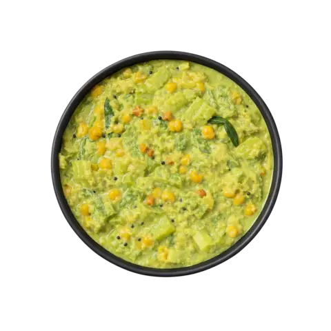 South Indian Pudalangai Kootu ready to eat snake gourd lentil curry in black bowl