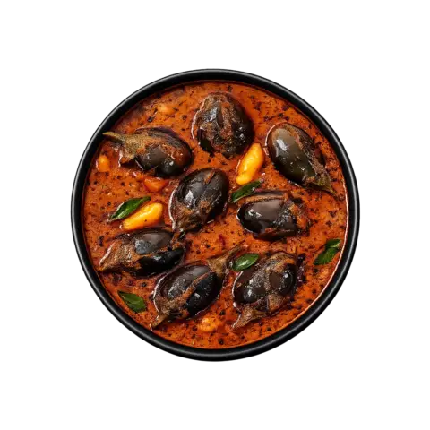 A premium 90-degree top-down flat lay of Pot and Ladle brand ready-to-eat Ennai Kathirikai Kuzhambu. The dish features small, tender whole purple brinjals simmered in a rich, dark roasted-spice and tamarind gravy. The glossy surface shows a traditional oil tempering with mustard seeds and curry leaves, served in a minimalist black bowl on a seamless white studio background.