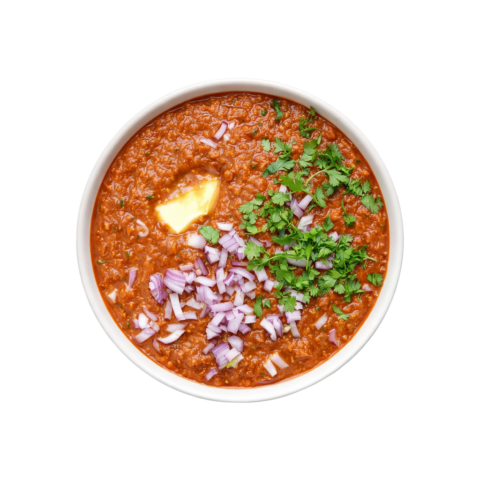 A premium, ready-to-eat serving of Pot and Ladle brand Mumbai-style Pav Bhaji Masala. The 90-degree flat lay shows a white bowl filled with thick, buttery mashed vegetable gravy, topped with melting butter, fresh coriander, and diced onions. The image is captured on a seamless white background for a clean, high-end commercial food aesthetic.