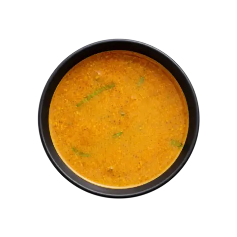 Pot & Ladle Tiffin Sambar ready to eat served in black bowl with retort pouch