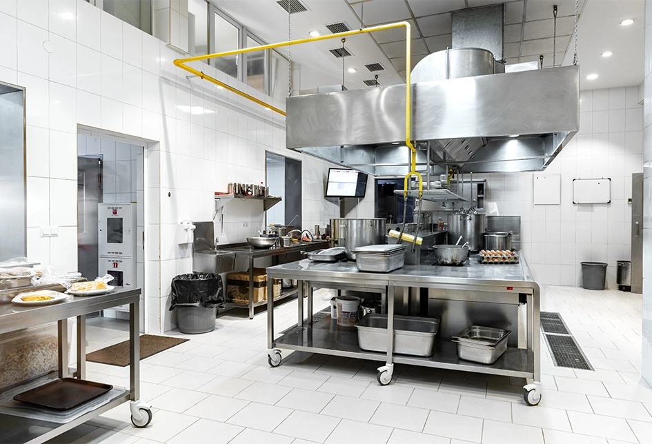 Modern commercial kitchen appliances in a professional restaurant kitchen used for ready-to-eat food production.